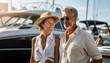 An elite, affluent couple strolls leisurely by a marina, exuding elegance and prosperity. A luxury yacht serves as the backdrop, encapsulating their high-end lifestyle and opulence
