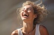 Portrait photography of a beautiful woman laughing and creative natural lighting