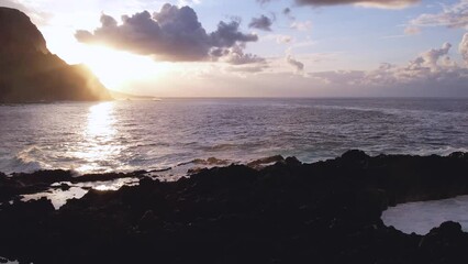 Wall Mural - Aerial sunset light over ocean and volcanic cliffs of Tenerife Canary Island Spain