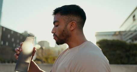 Sticker - Fitness, man and drinking water in city for sports break, energy and workout performance. Thirsty athlete, indian runner and bottle for hydration, nutrition and healthy recovery of outdoor exercise