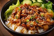 A Delicious Chicken Teriyaki Bowl Topped With Rice, Lettuce, Cucumber, Sesame Seeds, And A Delectable Teriyaki Sauce That Will Make Your Mouth Water