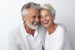 Beautiful gorgeous 50s mid age elderly senior model couple with grey hair laughing and smiling. Mature old man and woman close up portrait. Healthy face skin care beauty, skincare cosmetics, dental.