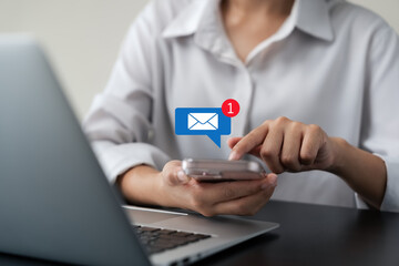 Email notification, businesswoman using smartphone with email notification icons, technology, internet, connection and innovation.