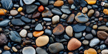 River Rocks Or Stones In A Seamless Tiled Pattern. Naturally Polished And Rounded River Pebbles Create A Repeating Background Texture.