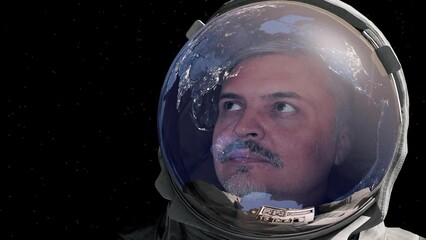 Wall Mural - portrait of man astronaut in outer space wearing helmet looking at earth globe. sci-fi expedition, p