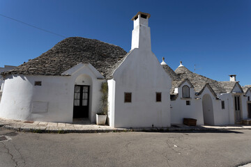 Wall Mural - The Trulli of Alberobello, the typical limestone houses in the province of Bari, Puglia, Italy