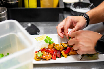 Poster - chef cooking chicken sweet and sour sauce on kitchen