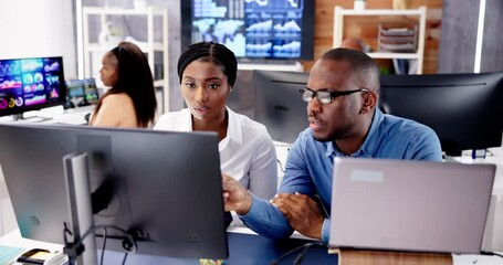 Poster - African Financial Data Analysts Using Dashboard On Screens