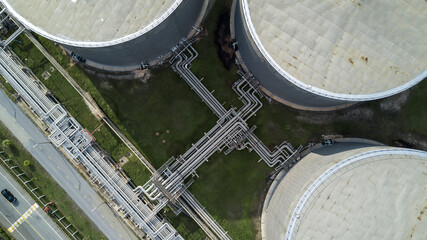Wall Mural - Aerial view liquid chemical tank terminal, Storage of liquid chemical and petrochemical products tank, Oil and gas storage tanks at industrial oil refinery.