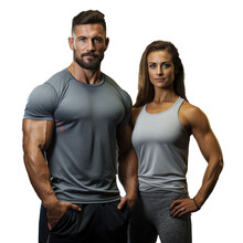 Athletic couple in gym arms crossed