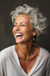 © fotogurmespb - Beautiful senior model woman with grey hair smiling and laughing emphasizing healthy skin and dental care
