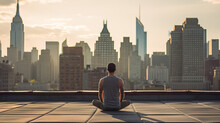 Man On A City Rooftop, Yoga Mat Spread Before Him. He Is In A Serene Pose, His Body Forming Elegant Lines Against The Backdrop Of The Urban Skyline