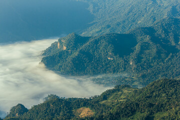 Wall Mural - Sunrise, morning fog and the mountain