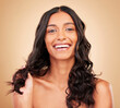 Hair care, smile and portrait of woman in studio with salon keratin treatment for curls. Makeup, cosmetic and headshot of Indian female model with long, shiny and clean hairstyle by brown background.
