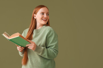 Poster - Young woman reading book on green background