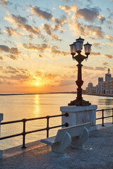 Canvas Print - Bari seafront. Colorful amazing sunset. Coastline and city view.