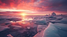 Polar Landscape At Sunset, With The Sky Aglow In A Kaleidoscope Of Reds, Oranges, And Pinks, Reflecting Off The Icy Mountains And Glaciers, Showcasing The Sublime Beauty Of Nature's Vivid Canvas.