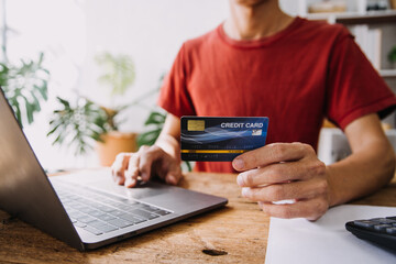 Businesswoman hands holding cradit card and using credit card online shopping. Online shopping concept