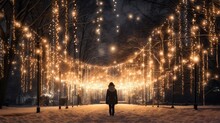 Girl In The Park Adorned With Strings Of Twinkling Lights Against A Snowy Backdrop, Capturing The Whimsy And Magic Of The Winter Season.
