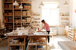 © TrueFrame Collective - Wood designer working in studio