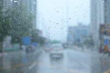 Wall Mural - traffic on highway with cars on rainy day, blur background