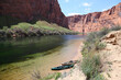 Two canoes on the shore of the Colorado river just south of the Glen Canyon Dam in Arizona.