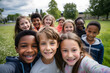 © sam - Class selfie in an elementary school. Kids taking a picture together in a co-ed school