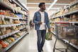 © Jeff Whyte - Customer shopping for groceries in a large grocery store.