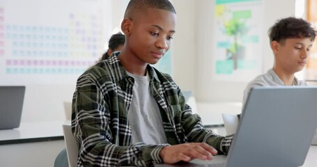 Teenager child, laptop and education at school with research, coding or computer science. Black kid in classroom with technology for learning, problem solving and system or software study at academy