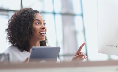 Happy african american businesswoman using digital tablet