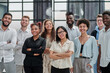 © Katsiaryna - group of successful business people standing in the office