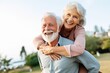 © lee - This image captures the joyous retirement lifestyle of a senior couple as they laugh, love, and enjoy an active and vibrant life together in nature. Generative AI