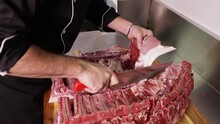 Slicing Pork Rib In The Kitchen