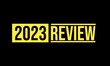 2023 year review isolated on black background. Creative design.