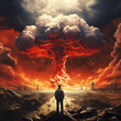 Nuclear war concept. The explosion of nuclear bomb. Creative art decoration in darkness. A person's outline opposes the giant mushroom cloud of atomic explosion.