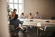 © Flamingo Images - Manager meeting with her diverse team