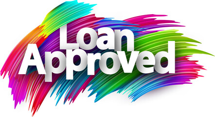 Loan approved paper word sign with colorful spectrum paint brush strokes over white.