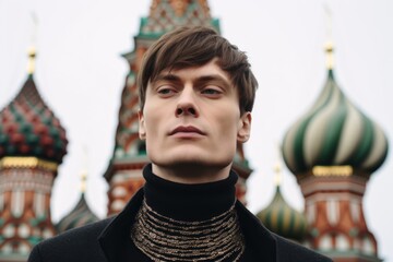 Close-up portrait photography of a blissful boy in his 30s wearing a dramatic choker necklace in front of the saint basils cathedral in moscow russia. With generative AI technology