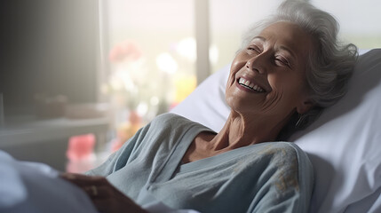 Senior female patient lying satisfied smiling at modern hospital patient bed. Excellent service at a for-profit hospital. 