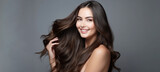 Model girl with shiny brown smooth healthy hair with long straight and glowing, skin natural beauty smooth skin for Care and hair products