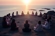 © PapatoniC - Group of Women practicing mindfulness in a circle near the ocean. top view with copy space and sunrise in the background
