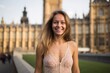 Medium shot portrait photography of a grinning girl in his 30s wearing a lace bralette at the palace of westminster in london england. With generative AI technology