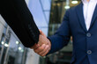 © Gonzalo - Business handshake for teamwork of business merger and acquisition,successful negotiate,hand shake,two businessman shake hand with partner to celebration partnership and business deal concept