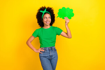 Canvas Print - Photo of thoughtful pretty girl dressed green t-shirt hairband rising mind cloud empty space isolated yellow color background