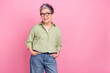 © deagreez - Portrait of minded clever professional manager lady put hands pockets look empty space isolated on pink color background