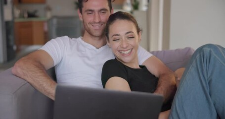 Canvas Print - Couple, laptop and laugh on sofa in home to watch movies, streaming multimedia and comedy show online. Happy man, woman and relax in living room at computer, funny video or entertainment subscription