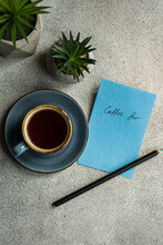 Mug Of Coffee And Note