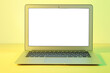 © Pixel-Shot - Modern laptop on yellow background