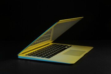 modern laptop on black background