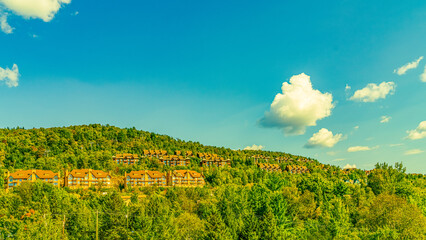 Wall Mural - Mont Tremblant, beautiful national park and village in perfect harmony with nature.The unique and wonderful Mont-Tremblant resort village, Quebec, Canada. High quality photo